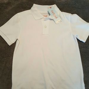 Brand new boys white, short sleeved polo shirt